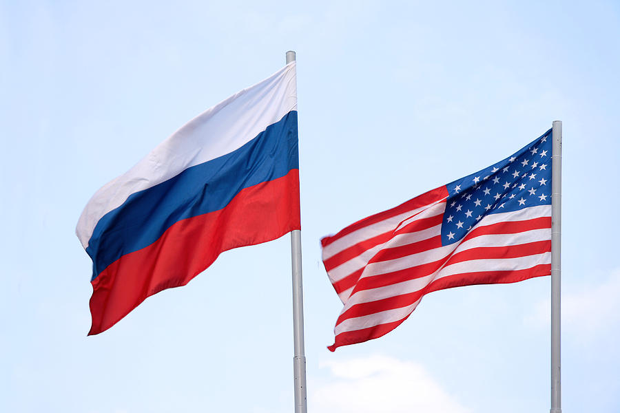 The Russian and American flags flying side by side Photograph by Mashabuba