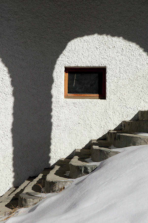 The Shadow Of An Arch On A Stucco Wall Photograph by Marc Volk