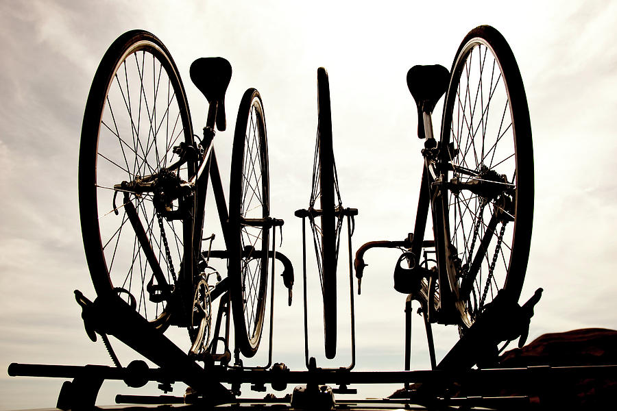 Transportation Photograph - The Silhouette Of Two Road Bikes by Jordan Siemens