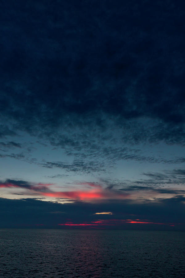 Sunset Photograph - The Sky, Horizon And Sunset Over Blue by Logan Mock-Bunting