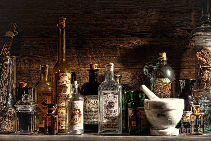 The Snake Oil Shop Photograph by Olivier Le Queinec
