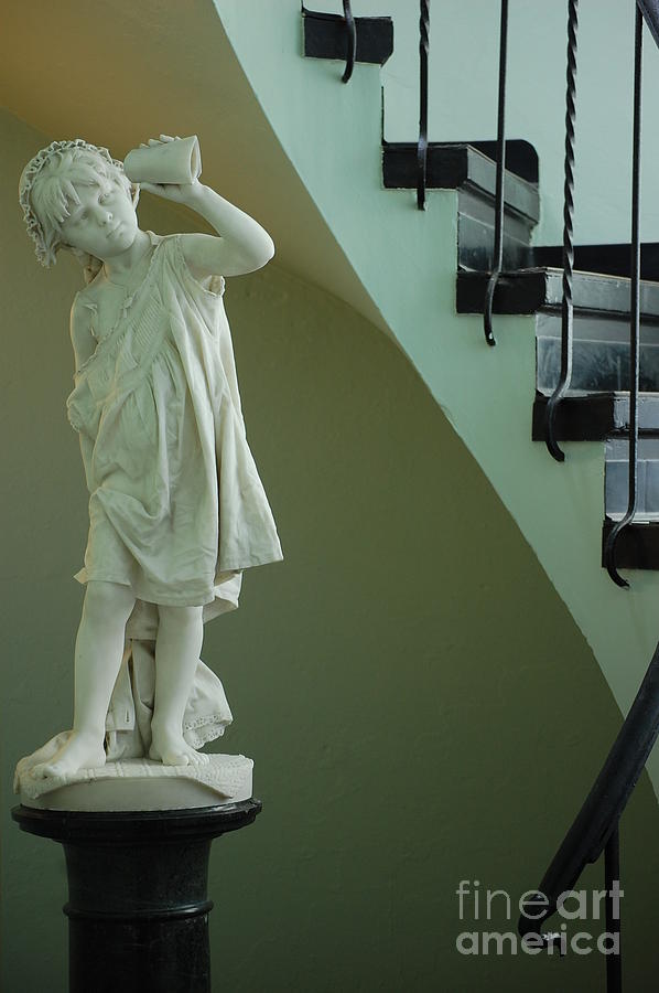The Statue in the Stairway Photograph by Robert Meanor