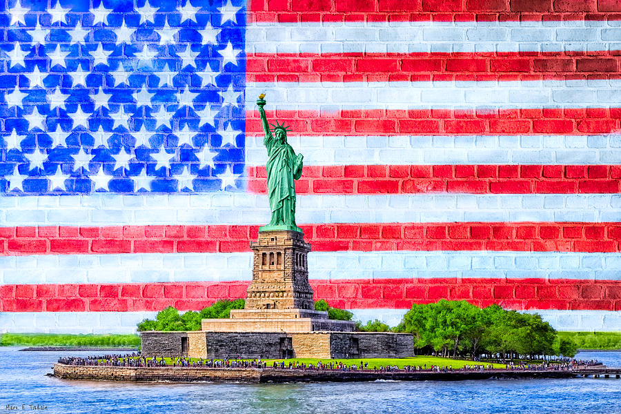 The Statue Of Liberty And The American Flag Photograph by Mark E Tisdale