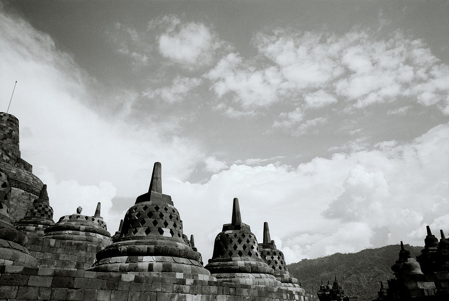 The Stupas Of Borobudur Photograph by Shaun Higson