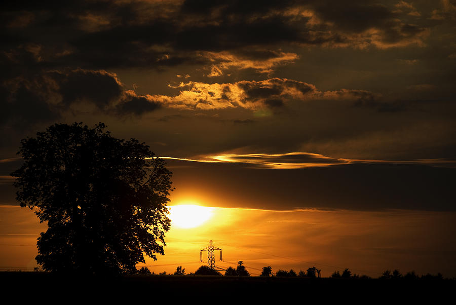 The Sun Sets Photograph by Rajiv Chopra