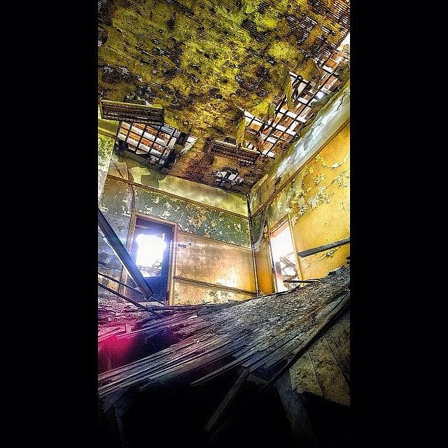 The Sunlight Pierces Thru The Decay Photograph by IKON Pennie