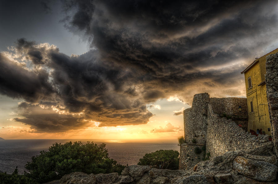 Castle Photograph - The sunset storm over the castle by Tommaso Di Donato