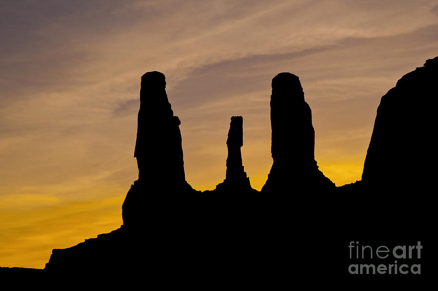 Monument Valley Three Sisters Photograph by Bob Phillips