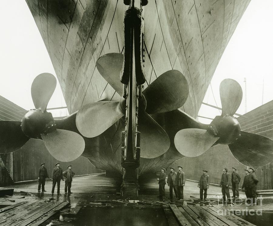 Titanic Photograph - The Titanics propellers in the Thompson Graving Dock of Harland and Wolff by English Photographer