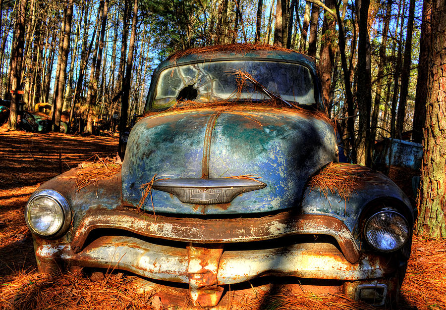 Truck Photograph - The Truck In The Woods by Greg and Chrystal Mimbs