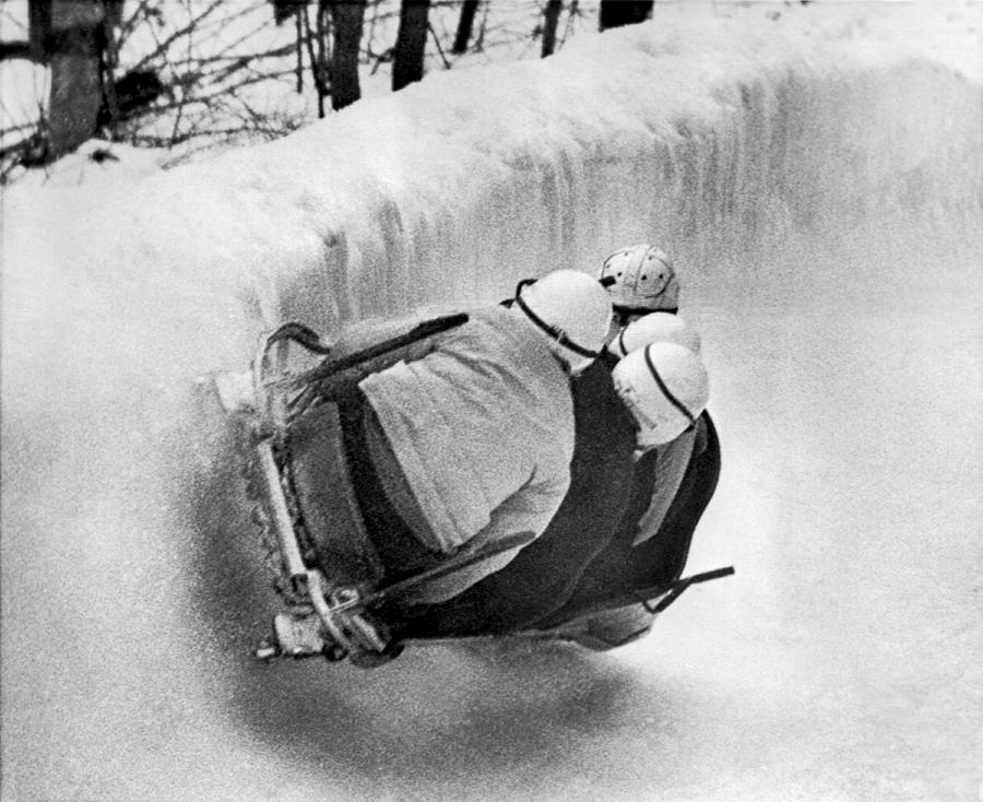 Athlete Photograph - The USA Bobsled Team On A Run by Underwood Archives