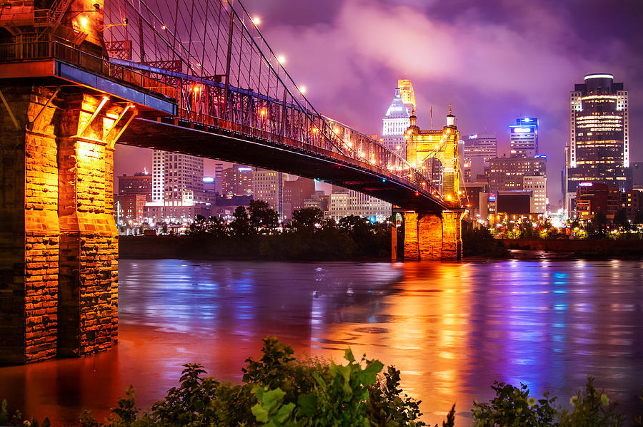 Cincinnati Skyline Photograph - The Vibrant Cincinnati Ohio Skyline and John Roebling Suspension Bridge by Gregory Ballos