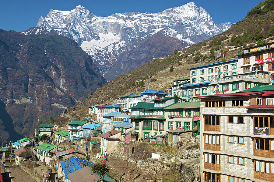 The Village Of Namche Bazaar And Khunde Photograph by Marc Pagani The Village Of Namche Bazaar And Khunde Photograph by Marc Pagani