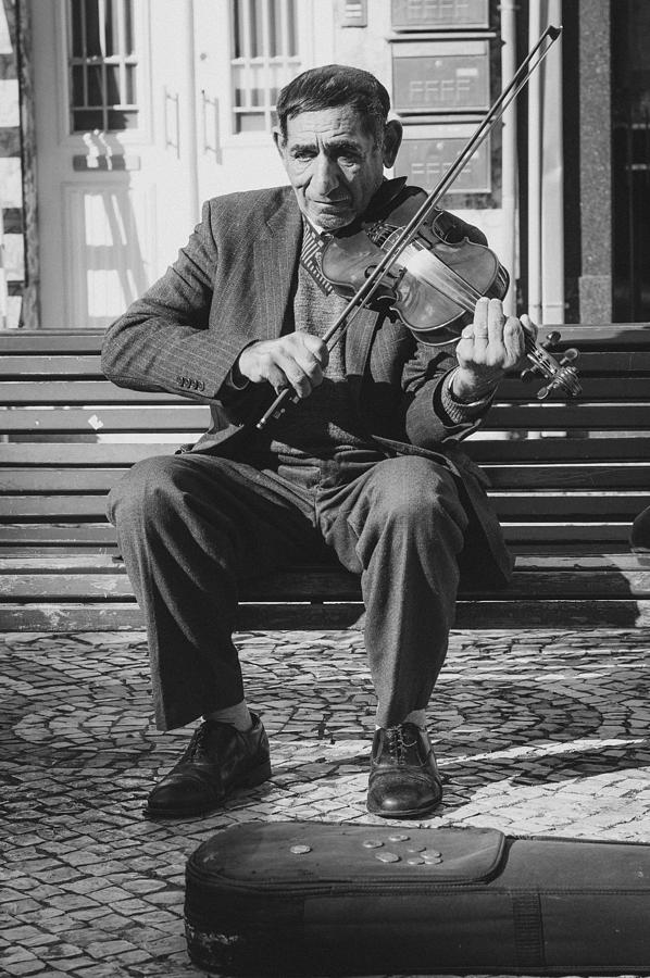 The Violin Player Photograph by Marco Oliveira
