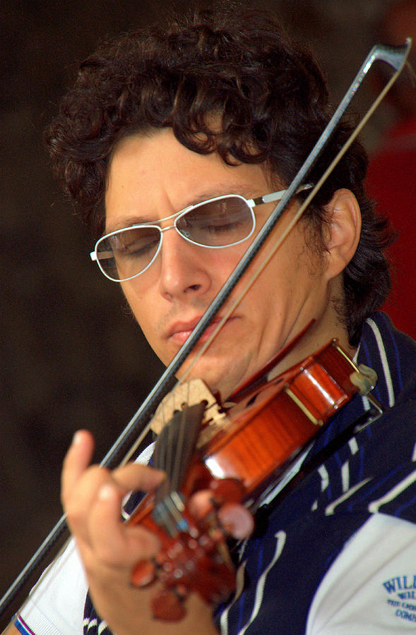 Music Photograph - The Violinist by Caroline Stella