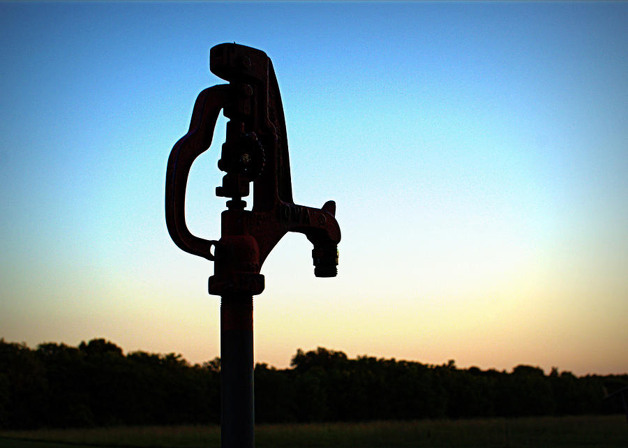 Sunset Photograph - The Water Hydrant by Cricket Hackmann