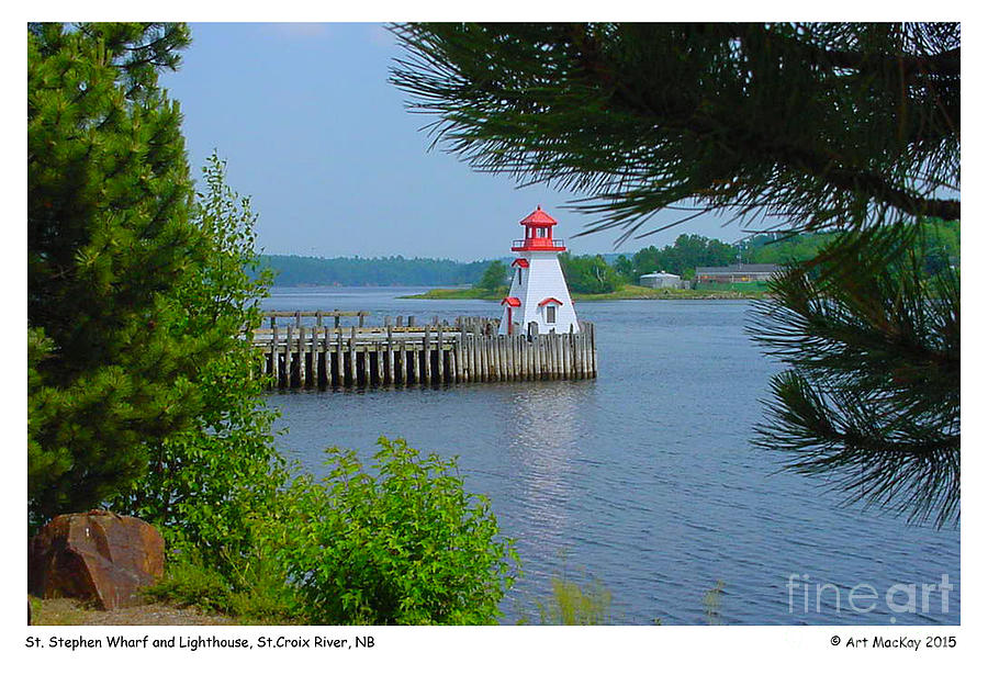 The Wharf and Lighthouse in St. Stephen NB Photograph by Art MacKay