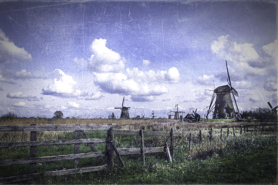 The Windmills of Holland Photograph by James Bethanis