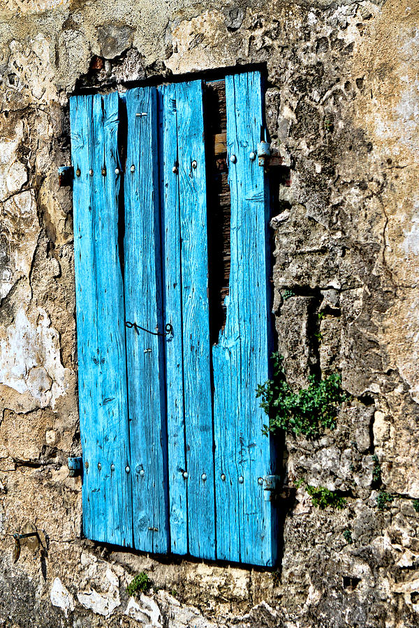 The worn blue shutter Photograph by Tom Prendergast