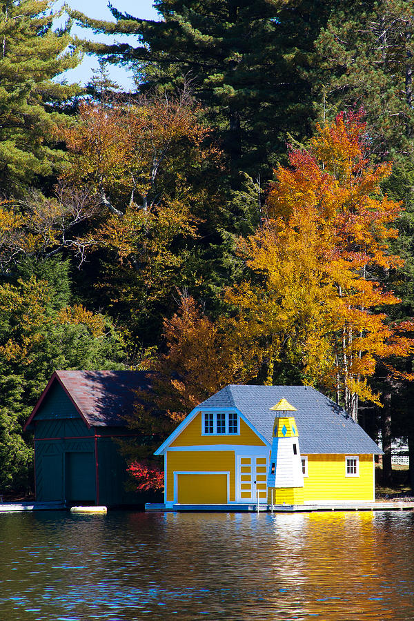 The Yellow Boathouse and Lighthouse Photograph by David Patterson