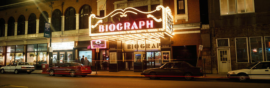 Architecture Photograph - Theater Lit Up At Night, Biograph by Panoramic Images