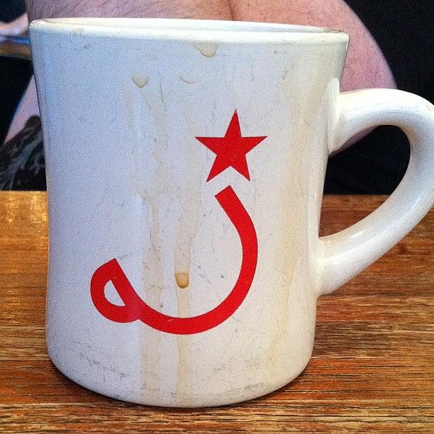 Their Symbol. Pardon The Used Cup Photograph by Michael Krajnak