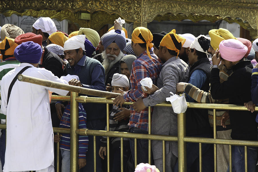 Action Photograph - Thick queue of devotees inside the Golden Temple in Amritsar by Ashish Agarwal