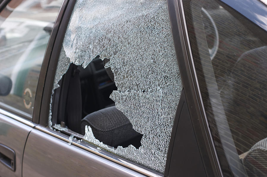 Thief broken glass in car window Photograph by Whiteway