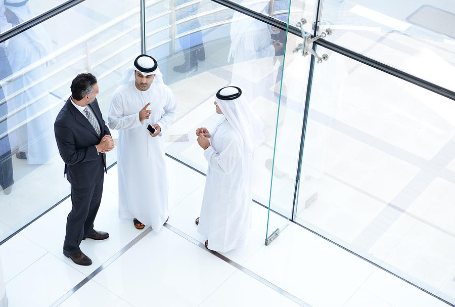 Three arab business men meeting Photograph by Olaser
