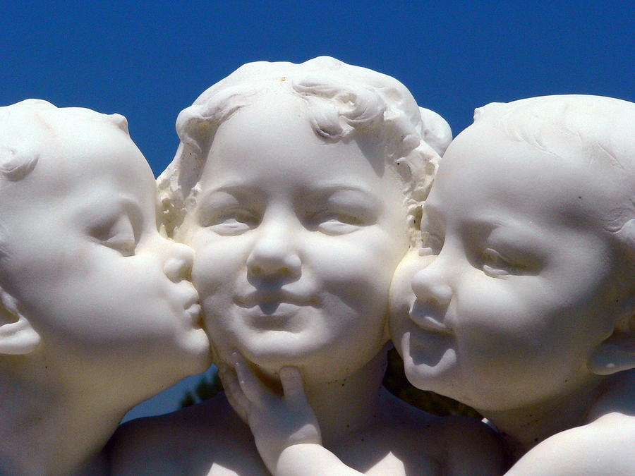 Three Baby Angels Photograph by Jeff Lowe