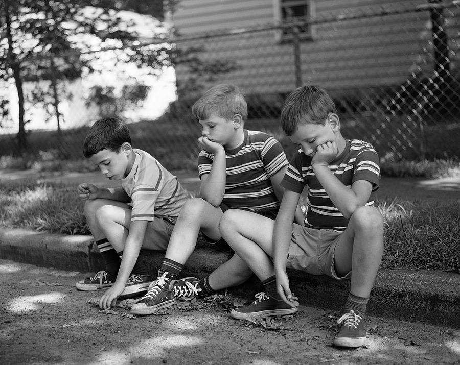 Three Bored Boys Sitting On Curb Photograph by H. Armstrong Roberts/ClassicStock