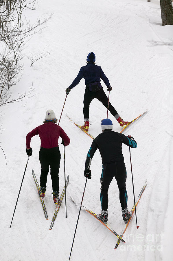 Three cross country skiers. Photograph by Don Landwehrle