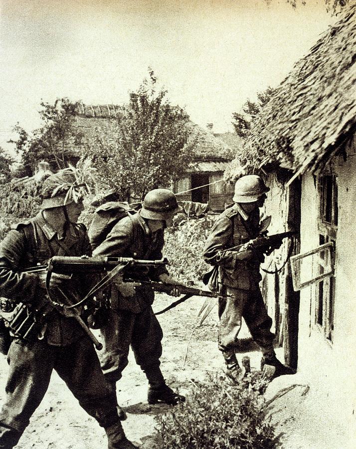 Summer Photograph - Three German Soldiers Search A  Russian by Mary Evans Picture Library