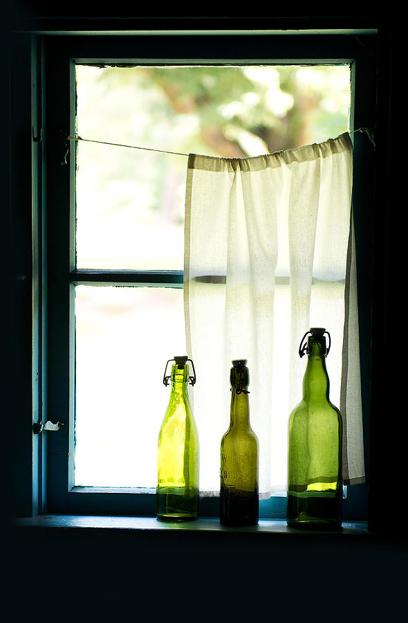 Still Life Photograph - Three green glass bottles and the window by Jaroslaw Blaminsky
