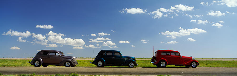 Nature Photograph - Three Hot Rods Moving On A Highway by Panoramic Images