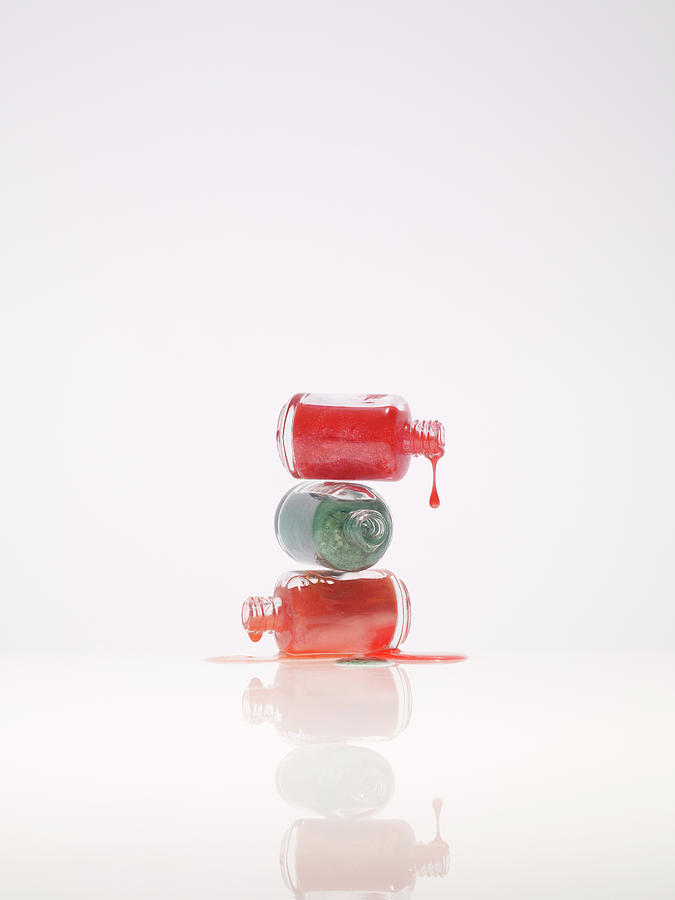 Three Kind Of Nail Polish Dripping From Photograph by Level1studio
