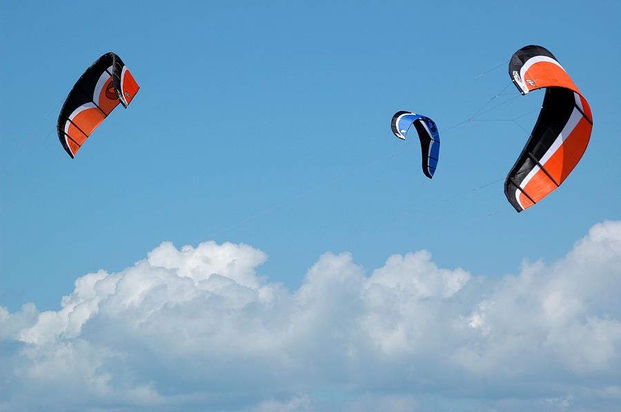 Three kite boarding kites at the 2007 Barmouth Kite Festival Photograph by Rob Huntley