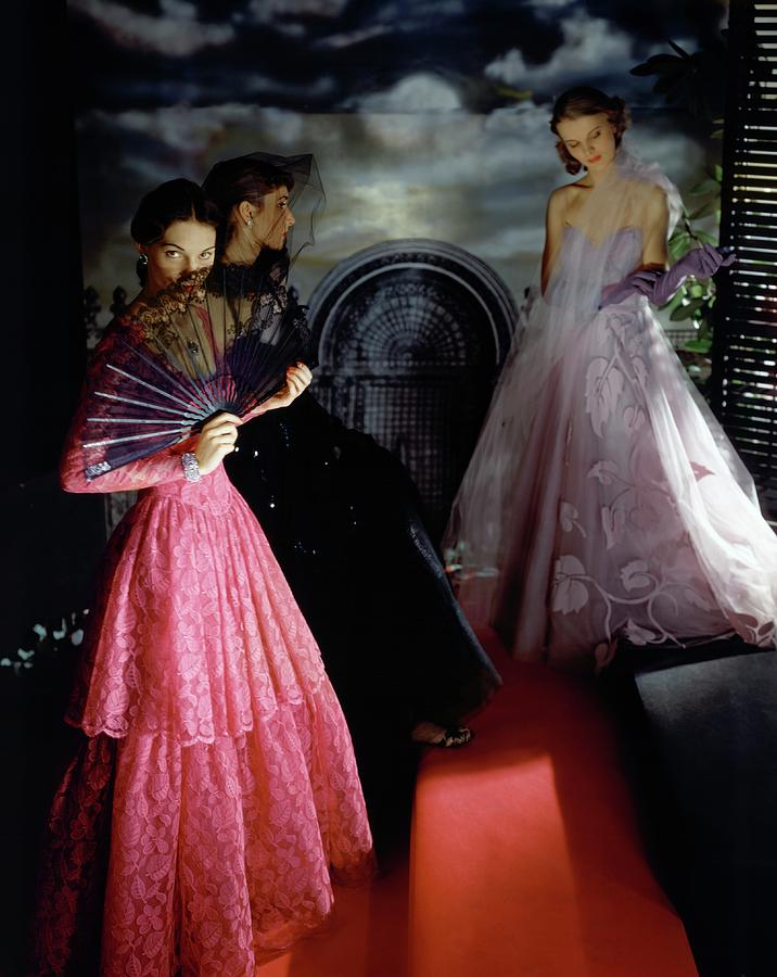 Three Models Wearing Ball Gowns Photograph by Horst P. Horst