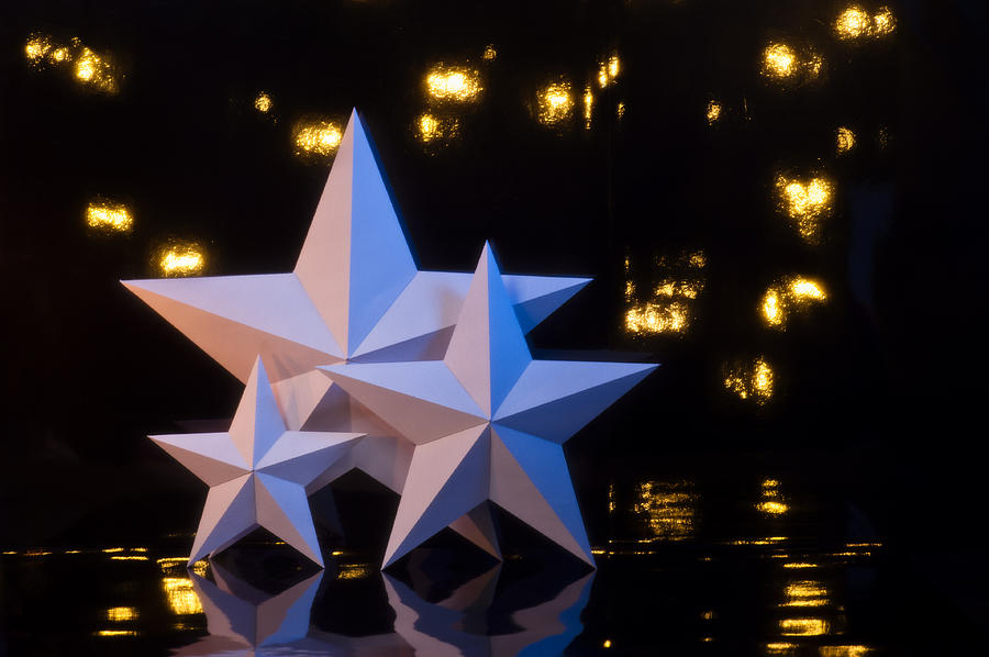Three paper cut stars Photograph by U Schade