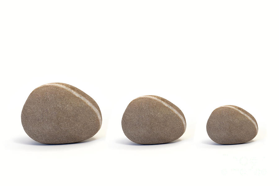 Pebbles Photograph - Three Pebbles against White Background by Natalie Kinnear