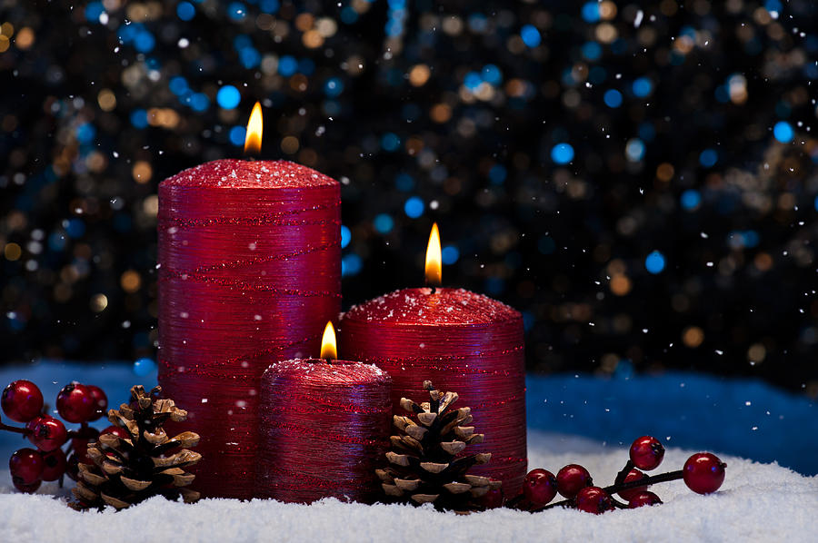 Three Red Candles in snow  Photograph by U Schade