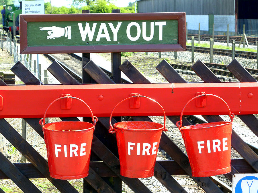 Three Red Fire Buckets and Way Out Photograph by Gordon James