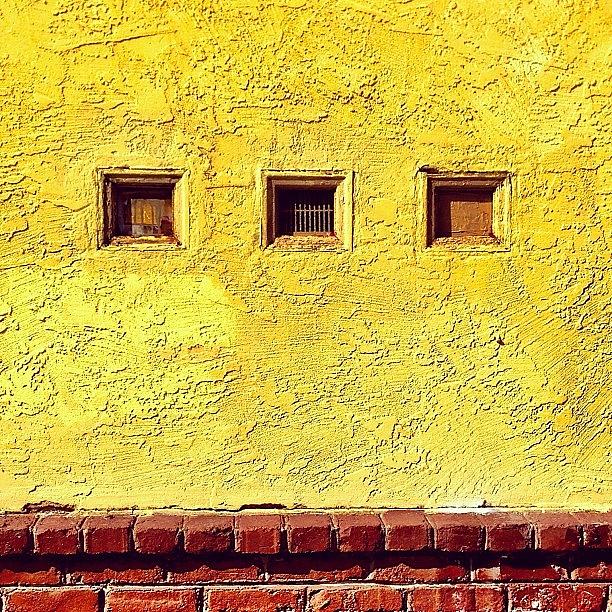 Brick Photograph - Three Tiny Windows by Julie Gebhardt