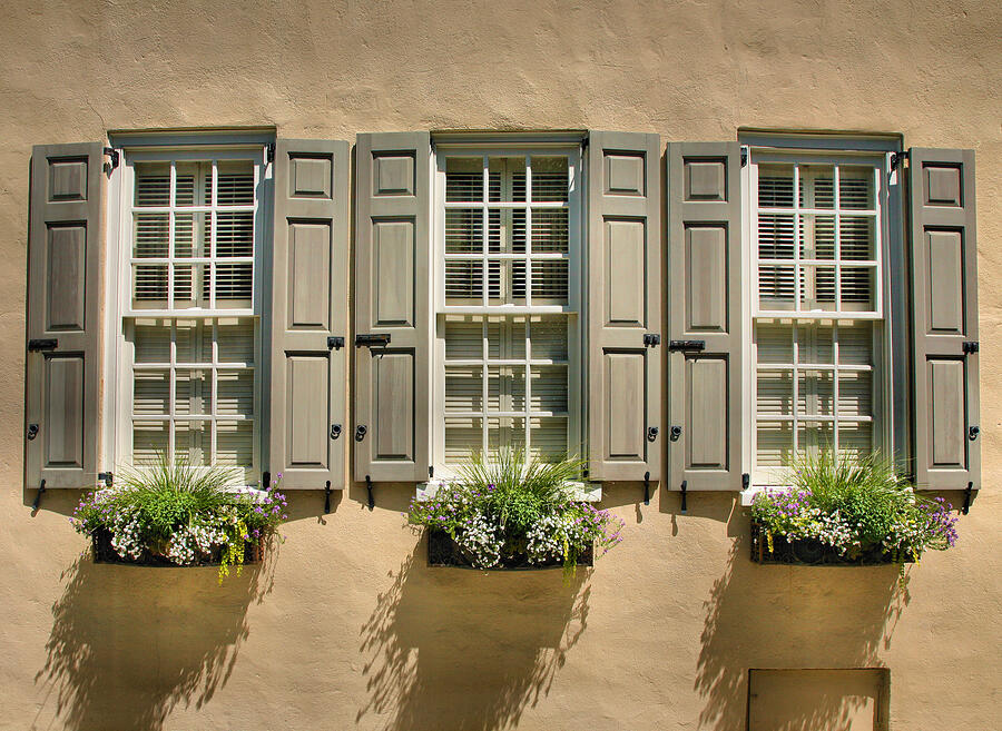 Three Windows and Flower Baskets Photograph by Steven Ainsworth Fine