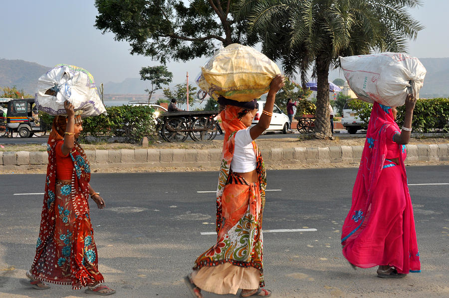 Three women carry bundles Jaipur Rajasthan India Photograph by Diane Lent