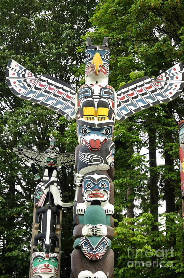Thunderbird Totems in Vancouver Photograph by Brenda Kean
