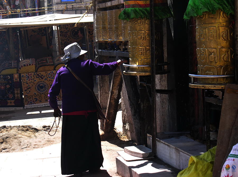 Tibet - Lhasa - Woman with Prayer Wheel Photograph by Jacqueline M Lewis