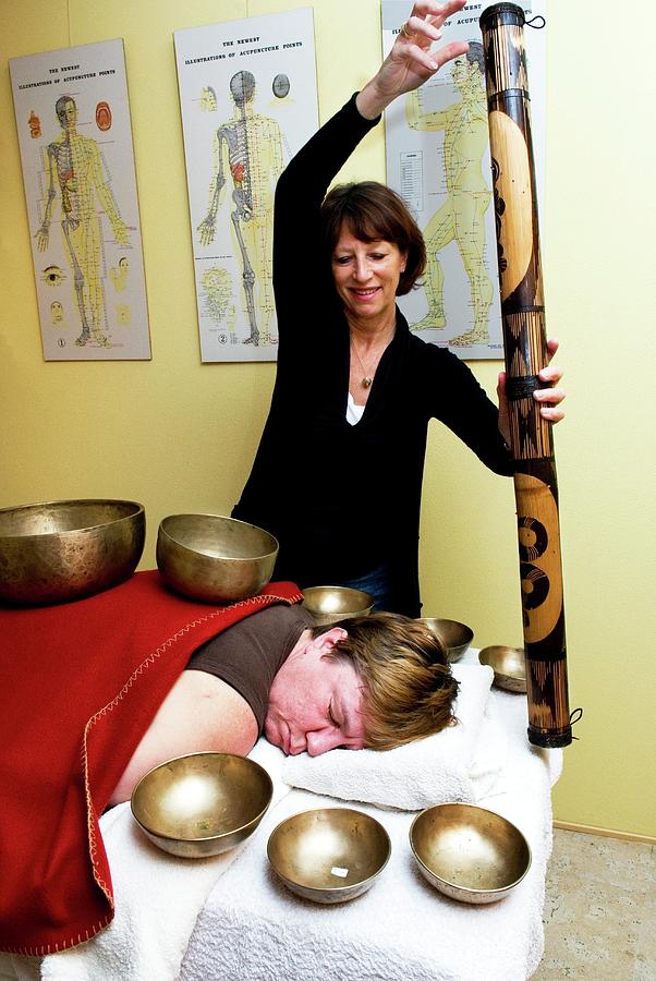 Tibetan Bell Therapy And Rainstick Photograph by Horacio Sormani/science Photo Library