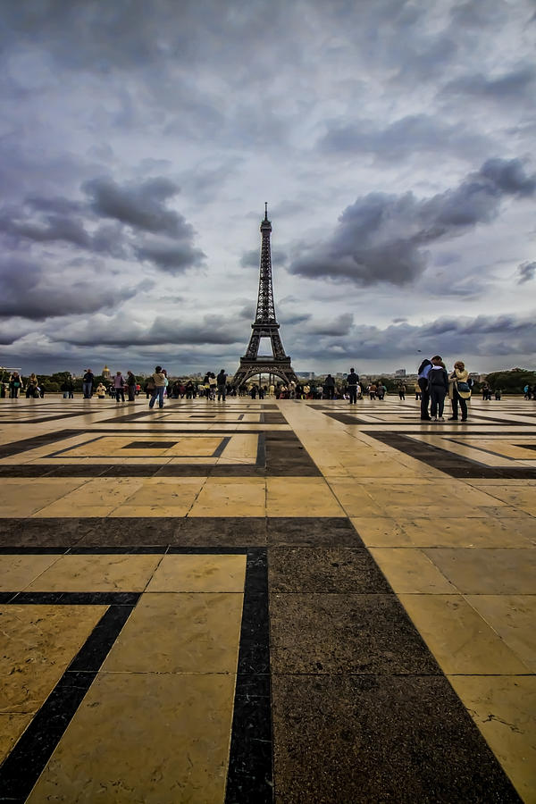 Tiles point to the Eiffel Tower Photograph by Sven Brogren