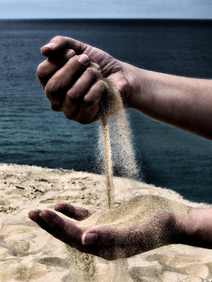 Hands and sand Photograph by Mike Santis